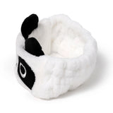 Plush panda headband, white with black ears and embroidered eye, 3/4 view product shot.
