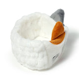 Angled product shot of a plush white cat headband featuring grey and orange ears and subtle embroidered face details.