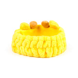 Yellow plush beauty headband with two small brown giraffe ossicones and matching yellow ears on top, shown from an angled view.