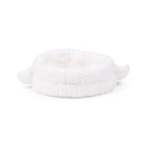 Angled view of a white plush headband with two ghost-shaped details.