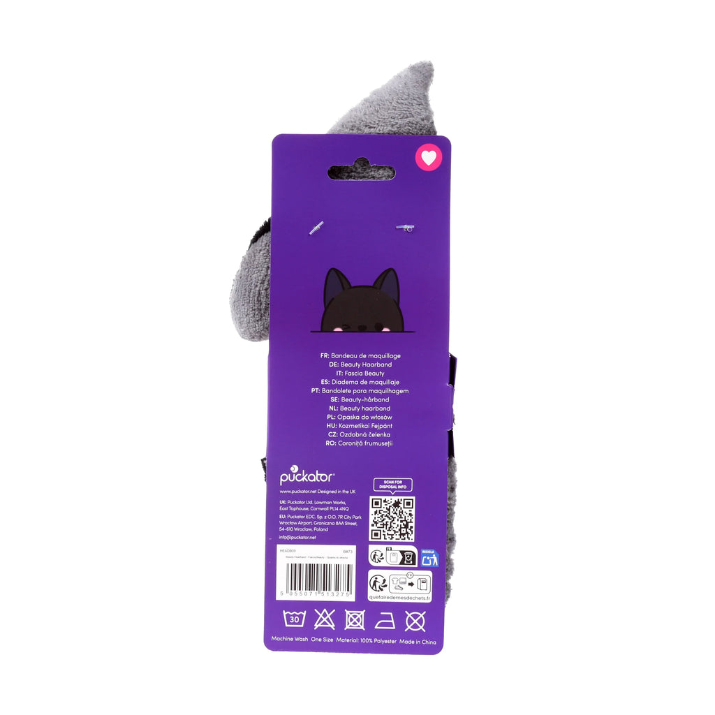 Reverse of purple retail packaging for a plush beauty headband, displaying a fluffy grey headband, a cartoon black bat design, and white text with care symbols.