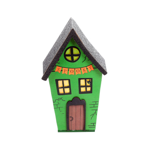 Front view of a tall, green Halloween LED decoration shaped like a spooky house, with a black glitter roof, an orange SPOOKY banner, yellow-lit windows, and a black cat silhouette visible in one window.