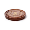 Angled view of a round, dark brown Sheesham wood incense holder and ashcatcher, featuring a central brass butterfly inlay surrounded by brass stars and multiple small brass holes for incense sticks and cones.