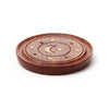 Angled top view of a round Sheesham wood incense holder, featuring a brass-coloured moon and stars inlay. The brown wooden ashcatcher has multiple holes for incense sticks and a central well for cones.