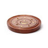 Angled view of a round Sheesham wood incense holder, showcasing its dark brown top surface with golden moon and star inlays, multiple holes for incense sticks, and a central depression for cones.