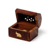 Angled view of an open dark Sheesham wood incense cone burner box, with a golden elephant inlay on the front and decorative cut-outs on the lid.