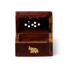 Front view of an open sheesham wood mini incense cone burner box, featuring a gold-coloured elephant inlay and circular ventilation holes on the underside of the lid.