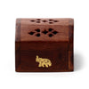 Front view of a Sheesham wood incense cone burner box with a golden elephant inlay and a decorative cut-out pattern on the lid.