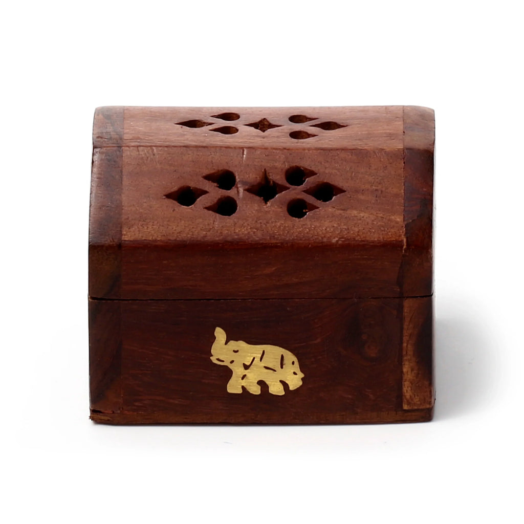 Front view of a Sheesham wood incense cone burner box with a golden elephant inlay and a decorative cut-out pattern on the lid.
