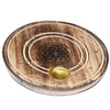 Angled view from above of a round mango wood incense holder and ashcatcher with a dark brown finish. It features an engraved Flower of Life symbol, a central brass-coloured cup for cones, and multiple small brass-coloured holes for incense sticks, all on a white background.