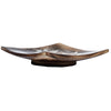 Side view of a dark brown mango wood incense ashcatcher, revealing its curved profile and small circular base. Subtle carved floral patterns are visible on the interior surface.