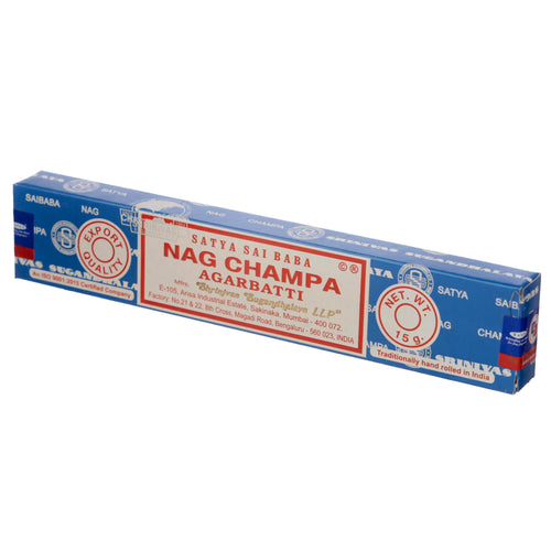 Front-angled view of a blue box for Satya Nag Champa incense sticks, displaying 'Nag Champa Agarbatti' text and a '15g' net weight.