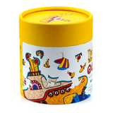 Angled front view of a 130-piece wooden jigsaw puzzle in a cylindrical yellow and white container, featuring The Beatles Yellow Submarine illustration.
