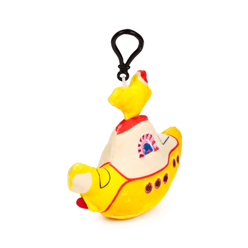 Angled view of a plush Yellow Submarine keyring, predominantly yellow and off-white with red details, featuring an embroidered window and a black clip.