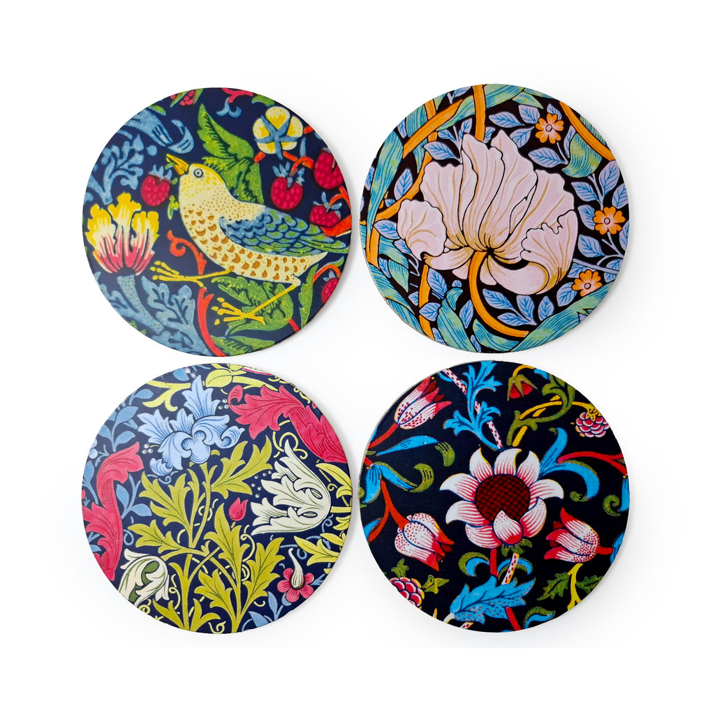 Top view of a set of four round, colourful William Morris style patterned coasters, featuring intricate floral and bird designs, arranged on a white background.