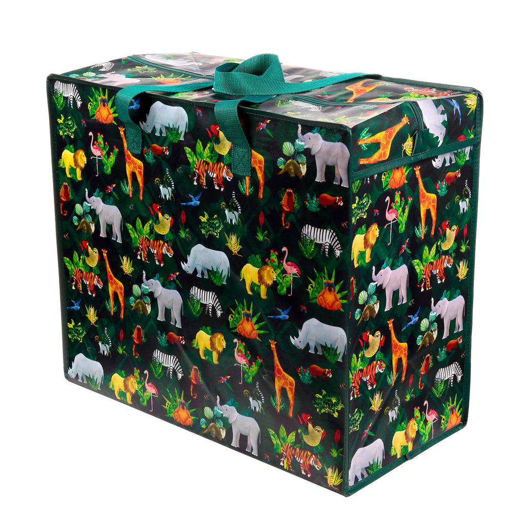 Angled view of a rectangular dark green laundry and storage bag, featuring a vibrant jungle animal print with elephants, giraffes, lions, rhinos, and zebras. The bag displays green webbing handles, one tied, and a top zip closure.