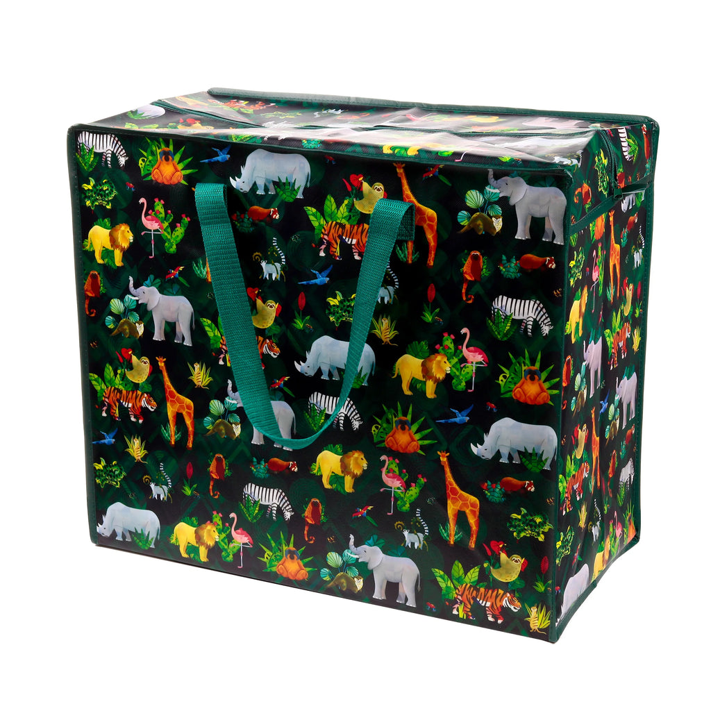 Angled view of a large, colourful 'Animal Kingdom' laundry and storage bag with a dark green background, featuring various jungle animals and green fabric handles.