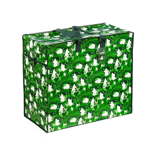 Angled view of a rectangular green laundry and storage bag featuring a white Moomin garden life pattern. It has dark green fabric handles and a top zip closure.