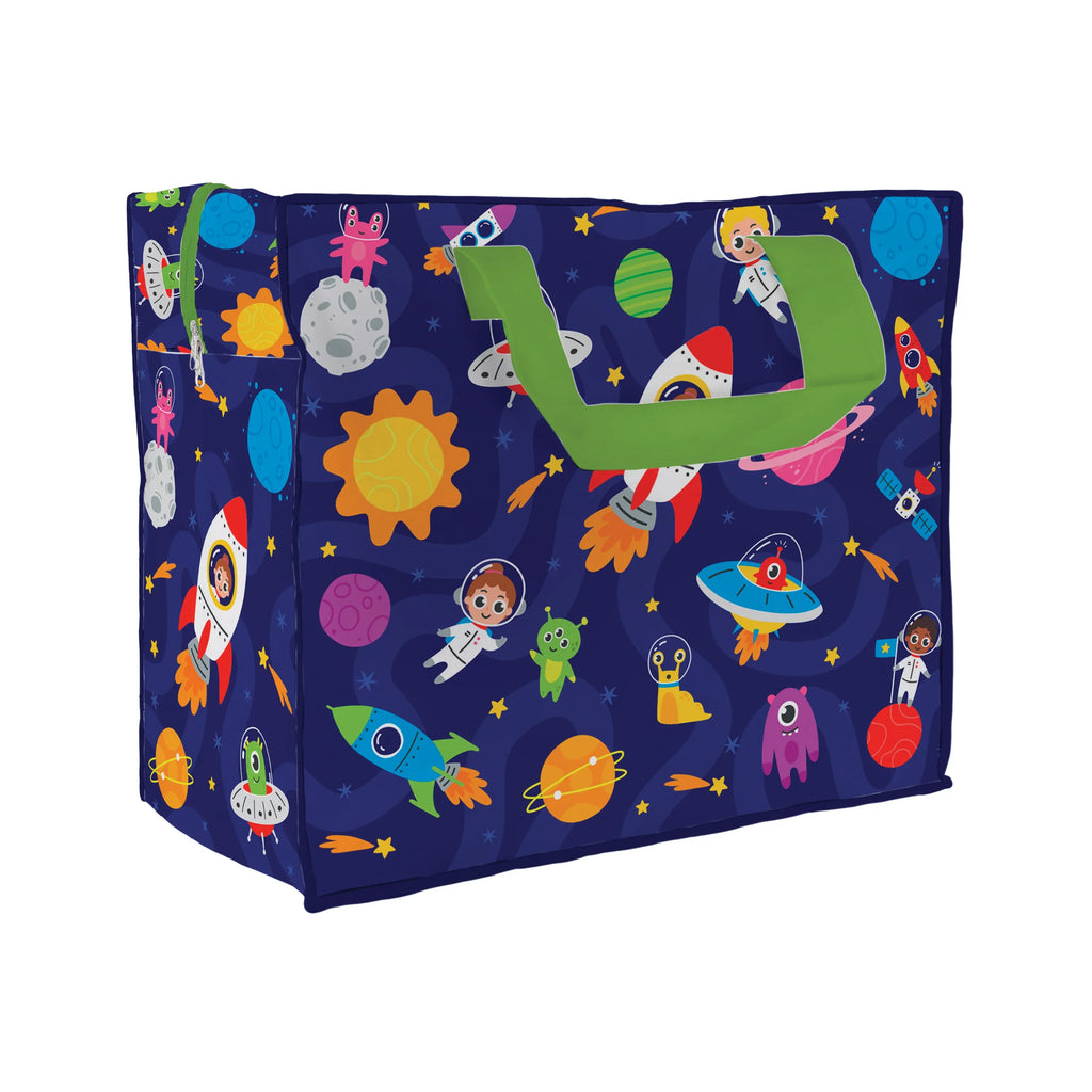 Angled view of a navy blue laundry and storage bag with bright green handles, featuring a colourful space cadet design with cartoon astronauts, aliens, rockets, and planets.