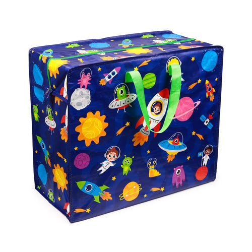 Angled view of a dark blue laundry and storage bag, decorated with a space theme featuring rockets, astronauts, aliens, planets, and stars. It includes bright green fabric handles and a matching green zip.