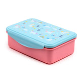 Angled view of a rectangular pink lunch box with a light blue lid, decorated with a colourful unicorn, rainbow, and cloud pattern. A light blue clip lock is visible on the side.