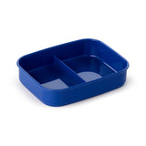 Angled view of a deep blue rectangular lunch box container with an internal divider for two compartments, on a white background.