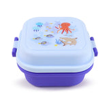 Angled view of a light blue and purple bento clip lock snack lunch box, with a colourful 'Mariniverse' design on the lid depicting an octopus, jellyfish, sharks, and fish, and featuring purple clip locks on the sides.