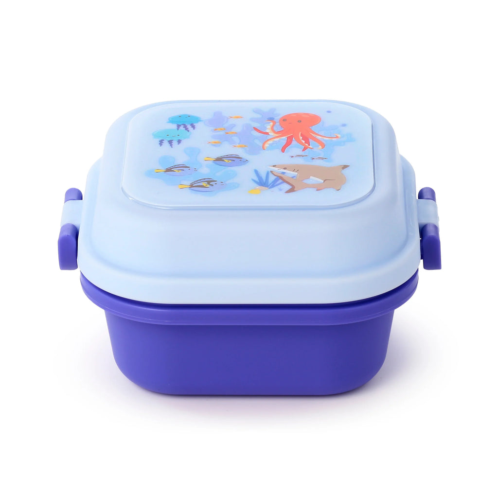 Angled view of a purple and light blue bento clip lock snack lunch box, featuring a marine-themed lid with an octopus, shark, and various fish.