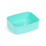 Angled view of a mint green rectangular plastic lunch box with rounded corners.