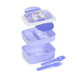 Angled view of a purple Moomin bento clip lock lunch box, showing two stackable compartments, one with internal dividers. The lid features Moomin characters, and a matching purple fork and spoon are placed next to the base.