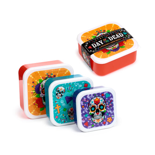 Angled view of three different-sized, colourful Day of the Dead sugar skull lunch boxes.