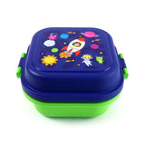 Angled view of a dark blue Bento clip lock snack lunch box featuring a space design with a rocket, child astronauts, alien, planets, stars, and sun on its lid, over a lime green base.