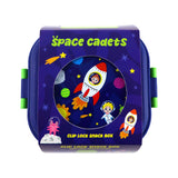 Front view of a dark blue Bento Clip Lock Snack Lunch Box, displayed in its packaging featuring a colourful 'Space Cadets' design with rockets, astronauts, an alien, planets, and stars. Green clip locks are visible on the sides of the box.