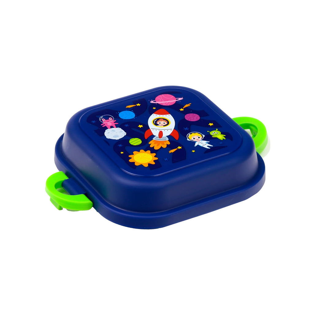Angled view of a dark blue bento clip lock snack lunch box with bright green clips, featuring a colourful space theme on the lid including a rocket, planets, stars, and astronauts.