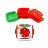 Front view of the Elidi the strawberry bento clip lock snack lunch box, displayed in its packaging with a red strawberry design and cartoon face, alongside separate red and green open lunch box compartments.