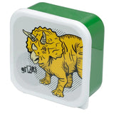 Angled view of a green and white dinosaur lunch box, featuring a yellow Triceratops illustration and 'grRRR!' text on the white lid.