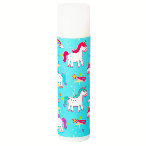 A lip balm stick, standing upright on a white background, featuring a vibrant turquoise pattern of white unicorns with pink and teal manes and tails, rainbows, and shooting stars, topped with a white cap.