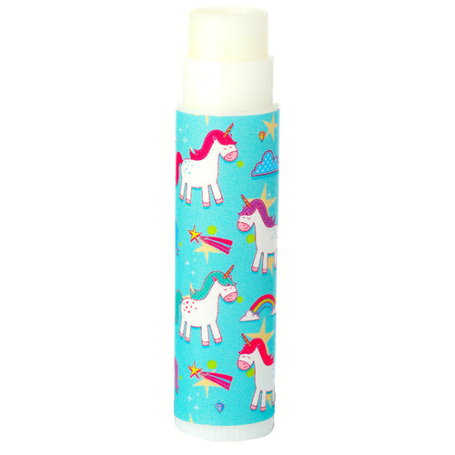 White lip balm stick with a vibrant turquoise wrapper, illustrated with colourful cartoon unicorns, rainbows, and stars. The white balm product is visible, extended from the top.