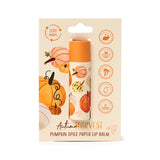 Front view of an Autumn Harvest Pumpkin Spice paper stick lip balm. The white tube with autumnal pumpkin illustrations and an orange cap is displayed on a cream-coloured backing card, featuring zero waste, cruelty-free, vegan, palm oil-free, moisturising, and plastic-free icons.