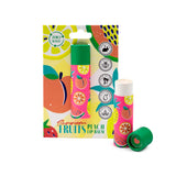 Angled view of two colourful paper stick peach lip balms. One is presented in its summer fruit-patterned packaging, which features Zero Waste, Plastic Free, and Cruelty Free labels. The other lip balm stands upright with its green cap off, displaying the white balm.