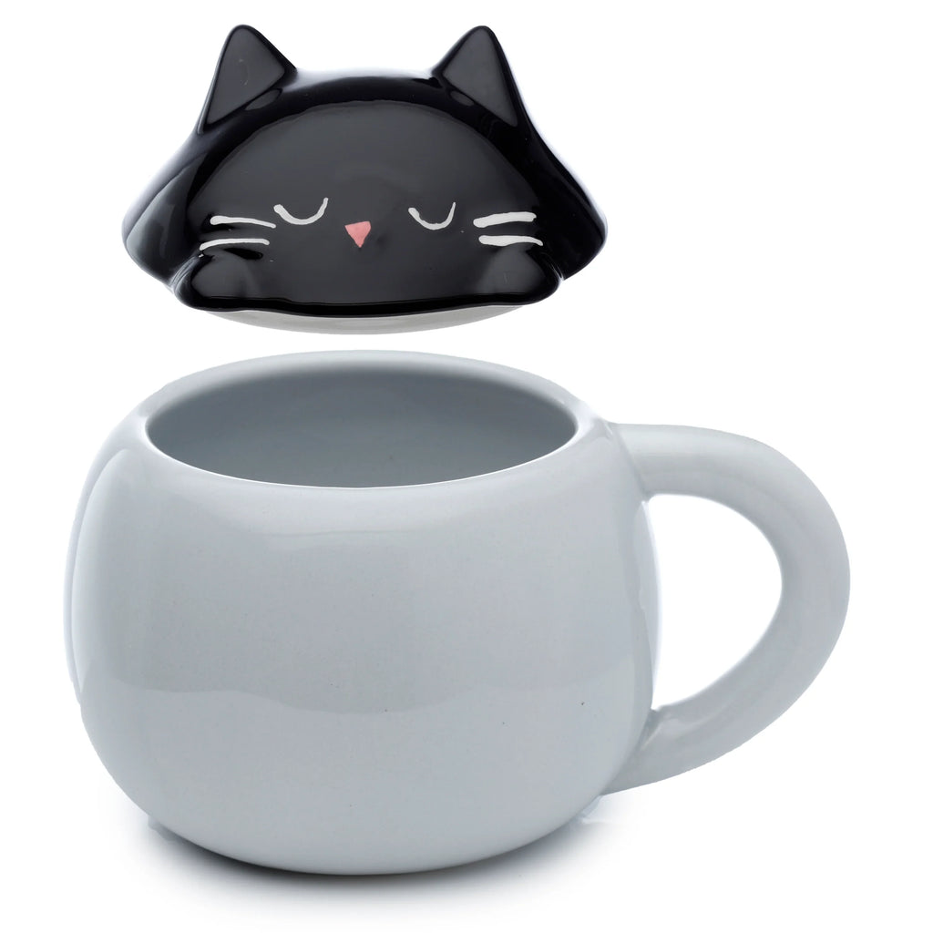Front  view of a rounded grey ceramic mug with a handle, featuring a separate black cat-shaped lid with closed white eyes and a pink nose.