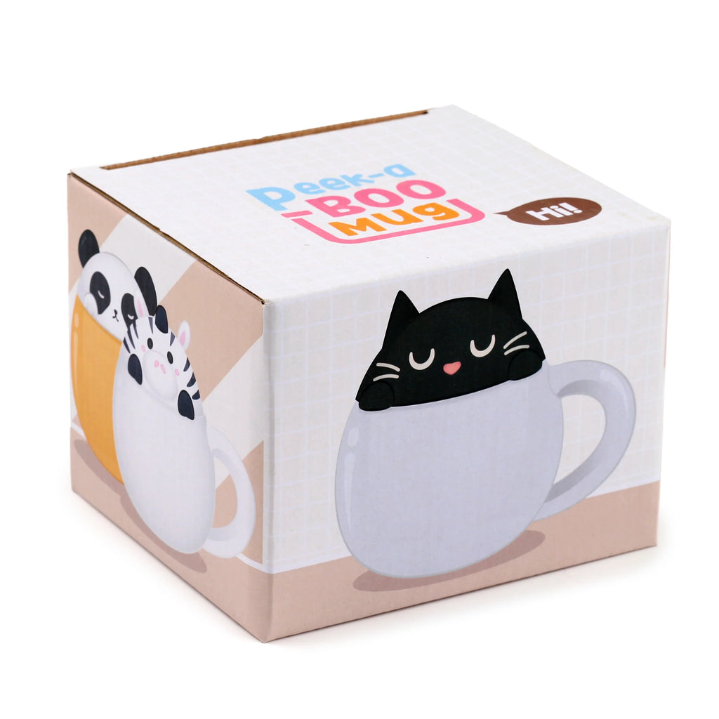 Angled view of a white packaging box for a mug, featuring a black cat peering from a white mug on the front, with 'Peek-a-BOO MUG' text and a panda and zebra illustration on the side.