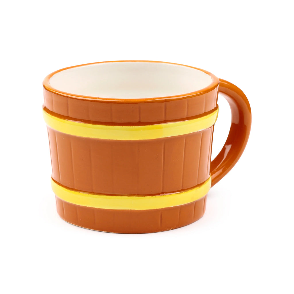 Ceramic mug with a brown barrel design, featuring vertical ridges and two yellow horizontal bands, seen from an angle revealing its off-white interior and brown handle.