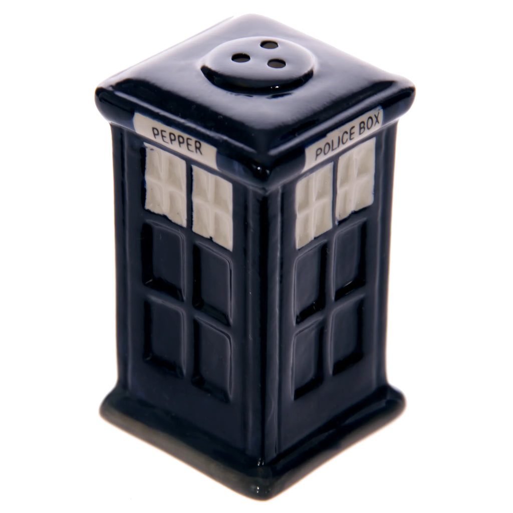 Angled view of a dark blue ceramic police box pepper shaker, detailed with white windowpanes and lettering 'PEPPER' and 'POLICE BOX', featuring three holes on its top.