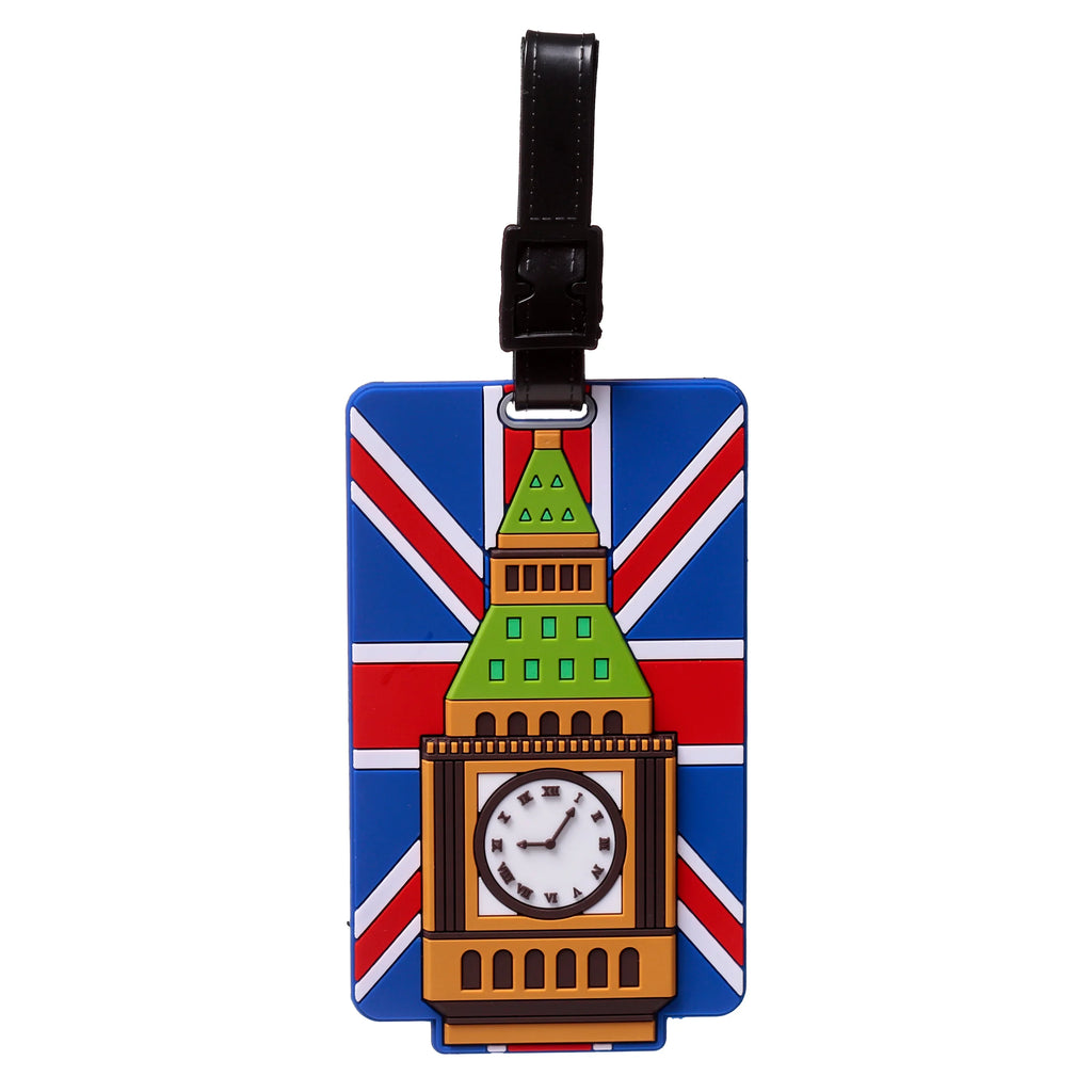 Front view of a PVC luggage tag featuring a Union Jack flag design and a detailed illustration of Big Ben with its clock face and green roof. A black attachment strap is at the top.