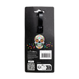 Front view of a PVC luggage tag, presented on black retail packaging, featuring a vibrant Day of the Dead sugar skull design with intricate floral patterns and bright colours.