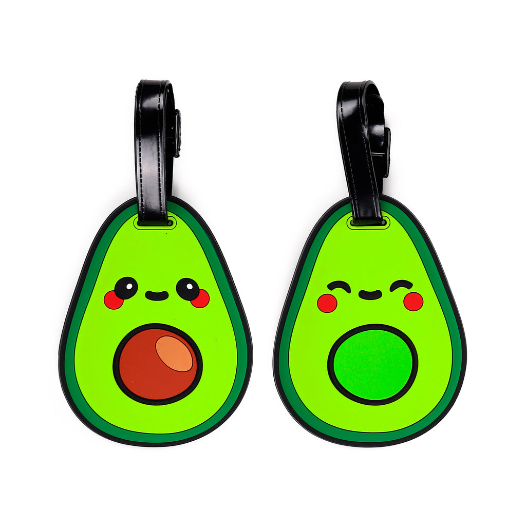 Front view of a set of two green PVC avocado luggage tags, each with a unique cartoon face and red cheek details, attached to a black strap.
