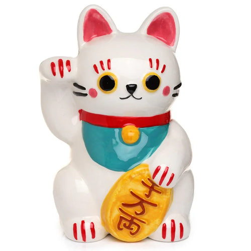 Front view of a white ceramic Maneki Neko lucky cat money box, featuring a raised paw and holding a gold coin with Japanese characters. It has a red collar, teal bib with a yellow bell, pink ear and paw details, and black eyes with pink cheeks.