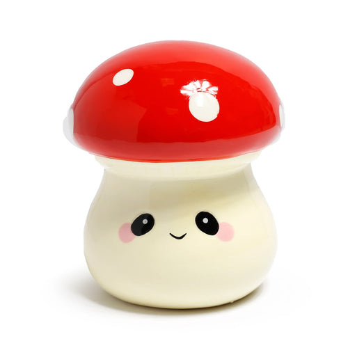 Front view of a cute ceramic money box shaped like a red and cream mushroom, with a glossy red cap, white spots, and a smiling face.