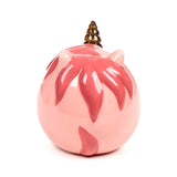 Rear view of a pink ceramic unicorn money box, featuring a golden horn, two small ears, and darker pink decorative markings.